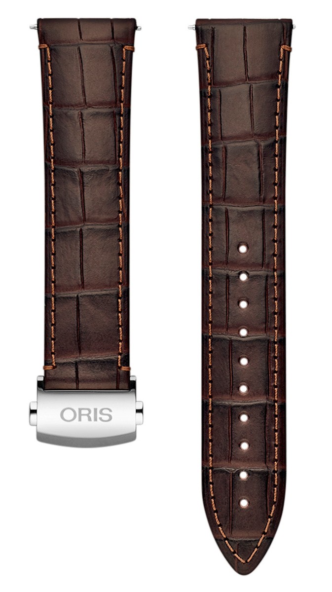 Ремешок для часов Oris из кожи теленка, темно-коричневый, со стальной клипсой Кожаные ремешки - стильные, надёжные и долговечные, способные составить достойную пару часам со стальным корпусом или часам из титана. Аксессуары из кожи не рекомендуется использовать в воде. У нас присутствуют только высококачественные материалы и оригинальный товар от производителя